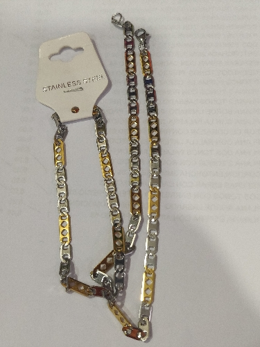 CADENA EN ACERO PLANA 2 TONOS CON ROMBO EN ESLABON DORADO CSA00066