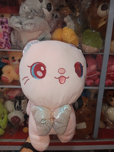 Gata rosa con moño