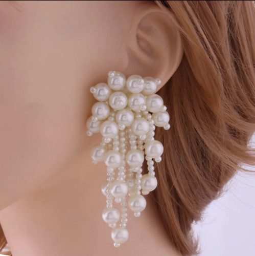 Arete perlas colgantes