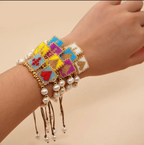 Pulsera perla corazon cruz colores