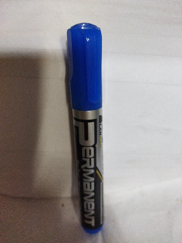 Marcador permanente punta fina azul