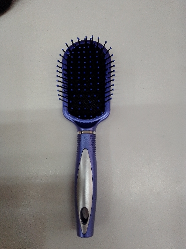 Cepillo pelo aro plateado 777