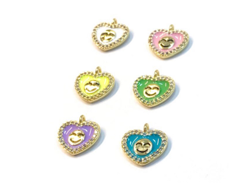 #13…Un Colgante mini corazón esmalto carita feliz con baño de oro y zircon