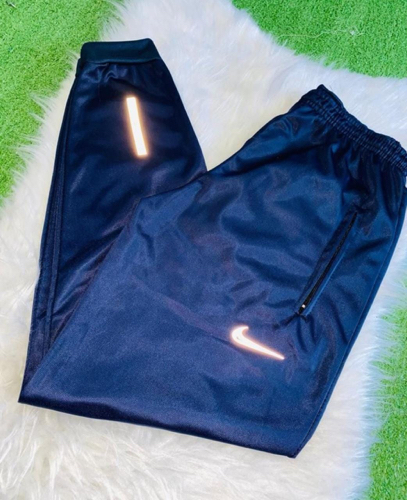 T: G Calça Nike refletiva azul