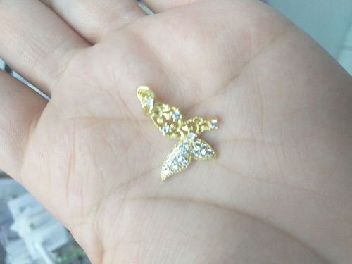 Dije mariposa dorado zirconia chapado 18K
