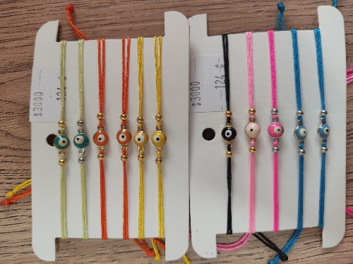 Pulsera hilo ojo acero
