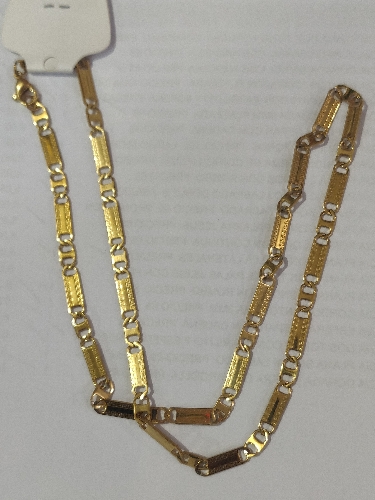 CADENA DE ACERO PLANA UN SOLO TONO  BORDE LABRADO DORADO CSA00023