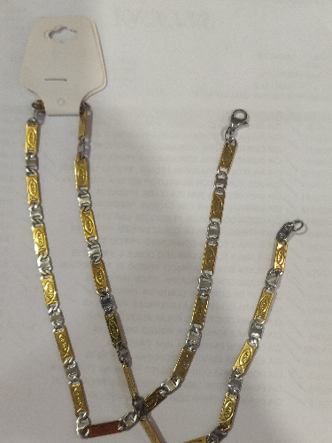 CADENA EN ACERO PLANA DOS TONOS PALABRA JESÚS CON PEZ EN ESLABON DORADO CSA000611