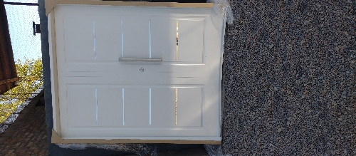 Puerta inyectada doble hoja 1,69*2