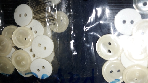 Boton blanco para camisa