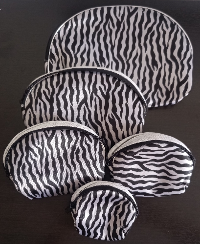 Cosmetiquera X 5 estampada rincón