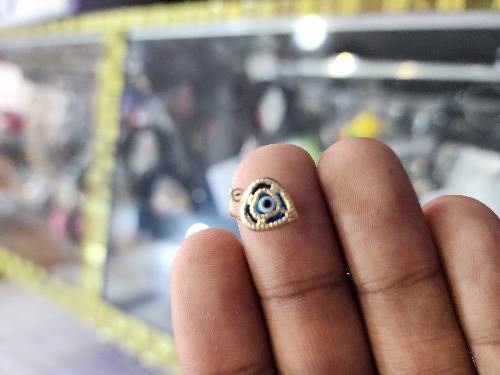 Medalla Ojo azul pequeño 0.7 Gramos
